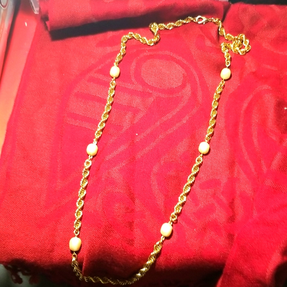 Long gold color necklace with Pearls fashion accessory